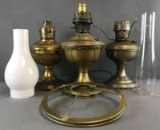 6 piece group brass oil lamps, chimneys, and more