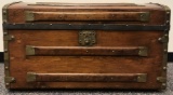 Wooden chest with brass trim