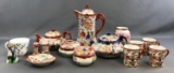 Collection of Oriental Tea Sets and Containers