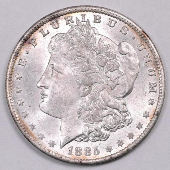 1885 O Morgan Silver Dollar.