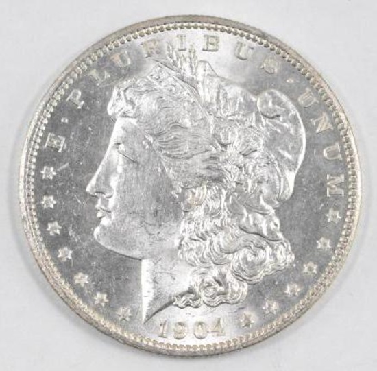 1904 O Morgan Silver Dollar.