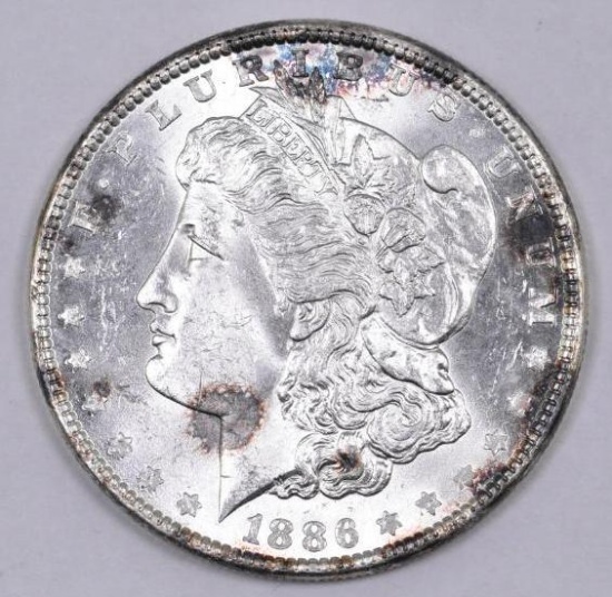 1886 P Morgan Silver Dollar.