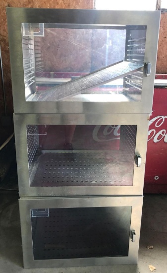 Group of 3 stainless steel storage containers.
