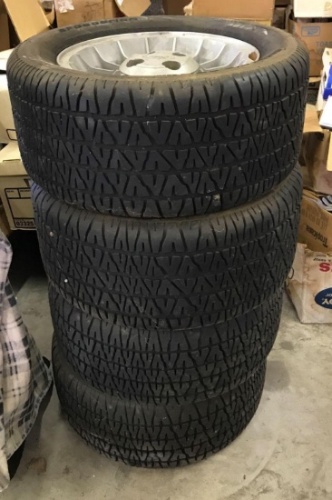 Set of 4 mid 1980?s Ford Mustang tires.