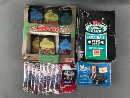 Group of 40+ unopened NFL trading card packs