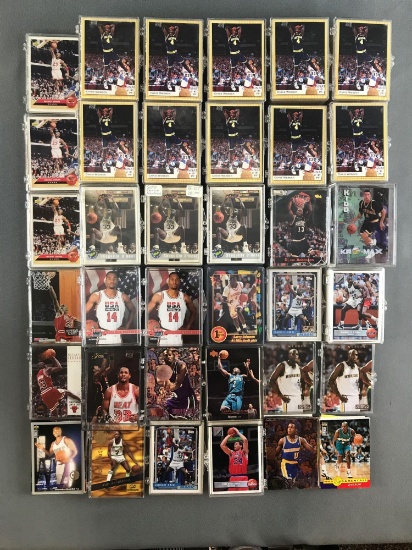 Group of 30+ plastic card cases holding assorted NBA trading cards and more