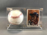 Hank Aaron signed Baseball card and baseball