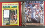Binder holding 10 assorted sports magazines