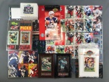 Group of 20+ pieces NFL trading card sheets, boxes, and more
