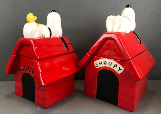 Group of 2 ceramic Peanuts Snoopy and His Dog House cookie jars