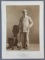 Antique photograph man with shotgun