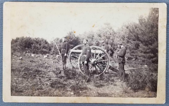 Antique photograph soldiers with cannon