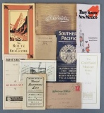 Group of vintage travel brochures, railroad time tables and more