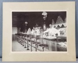 Vintage sepia photograph ice cream parlor, soda fountain counter