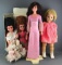4 piece group of assorted dolls