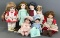 Group of 7 assorted porcelain collector dolls