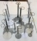 Group of 16 doll stands