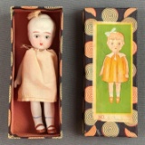 Vintage hand painted bisque doll in original packaging