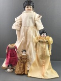 Group of 4 vintage China head dolls