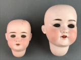 Group of 2 antique bisque doll heads