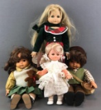 4 piece group assorted dolls