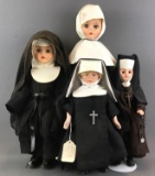 Group of 4 assorted Catholic Nun dolls
