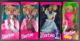 Group of 4 Mattel Barbies in original packaging