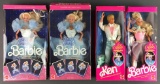 Group of 4 Mattel Barbies and Ken in original packaging