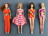 Group of 4 assorted Mattel dolls