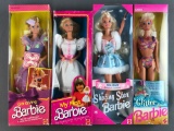 Group of 4 Mattel Barbies in original packaging