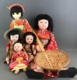 Group of 5 assorted Asian dolls