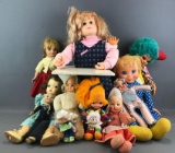 11 piece group of assorted dolls