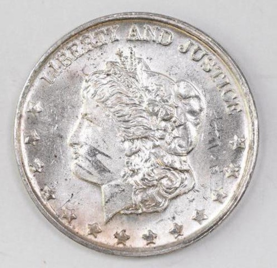 The International Silver Trade Unit Morgan/Scale 1oz. .999 Fine Silver