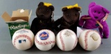 Group of baseballs and beanie babies