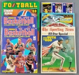 Group of sports sticker albums, cards
