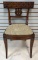 Antique Walnut Chair with Carved Swan Design
