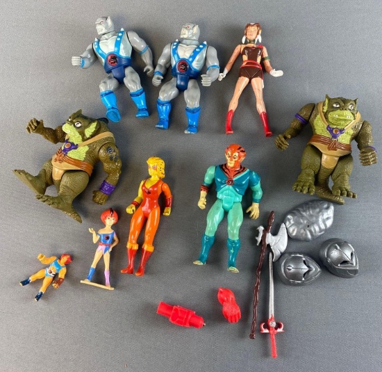 Group of 9 Thunder Cats Action Figures and Accessories