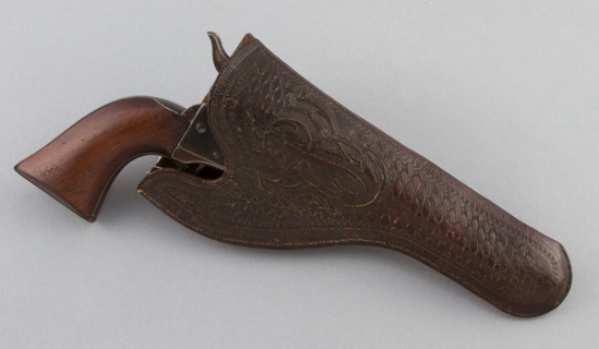 Vintage tooled Holster with basket weave style tooling.  Holster has been modified to slip behind be