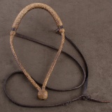 Finely braided rawhide Bosal with original hanger attributed to Luis B. Ortega.  Bosal measures 1/4