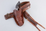 Single loop, left handed, Montana Holster and unmarked Belt.  Holster has maker mark on the inside o