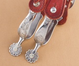 Outstanding pair of Russell Yates Spurs, #149, beautiful floral overlay, peacock style rowels.  Note