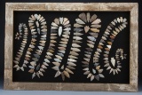 A framed collection of 212 Arrowheads in the Rattle Snake pattern, framed in wooden water stock barr