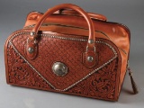 Outstanding hand tooled, Carry Bag made by the late Buddie Foster of Decatur, Texas with beautiful h