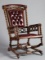 Ornate Hunzinger Gentleman's Platform Arm Rocker, (Circa 1900) 40