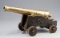 Brass Model Naval Cannon. Naval cannon with a massive polished brass barrel measuring 17