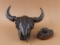 This  consists of two small Bronzes by noted Texas artist Covelle Jones:  (1) Buffalo Skull, 6 1/4