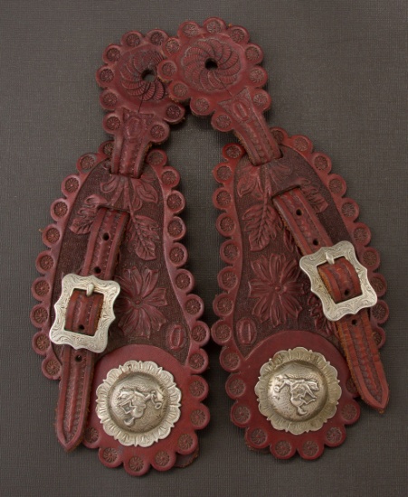 Pair of ornate hand tooled, two piece floral Straps by noted Leathersmith and Saddle Maker Casey Jor