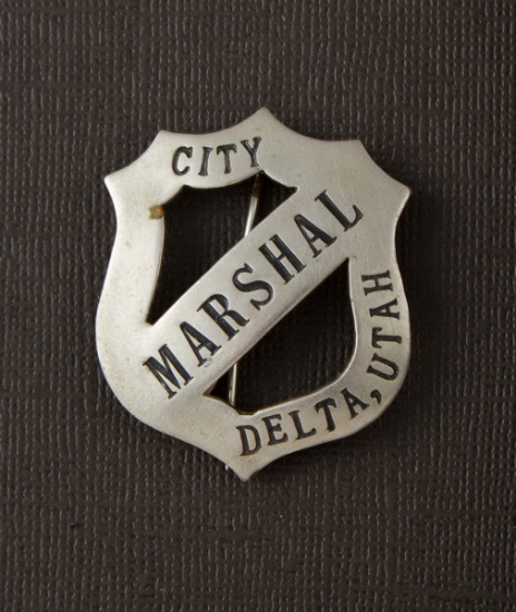 City Marshall, Delta, Utah, shield Badge with banner, 1 5/8" tall.  George Jackson Collection.