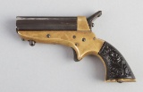 Brass frame Pepperbox by Uberti, .22 Rim Fire caliber with fancy grips, SN 5706.  Barrel is marked N