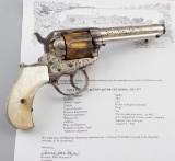 Beautiful factory engraved Colt 1877 Revolver with gold cylinder and pearl grips.  This is an outsta